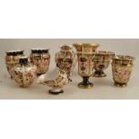 A collection of Royal Crown Derby Imari pattern pieces, to include a pair of vases, height 3.5ins, a