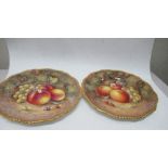 Two Royal Worcester plates, decorated with hand painted fruit by Ayrton, diameter 10.5in - not