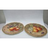 Two Royal Worcester plates, decorated with hand painted fruit by Love and Ayrton, diameter 10.