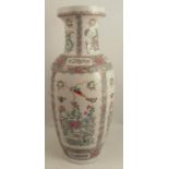 A large Chinese porcelain vase, decorated with birds, insects and flowers, height 25ins - Good