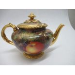 A Royal Worcester tea pot, decorated all around with hand painted fruit by Freeman, height 6.