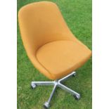 A mid-century Danish upholstered swivel chair, on five point aluminium star base by Jorgen