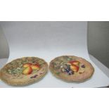 Two Royal Worcester plates, decorated with hand painted fruit by Love and Ayrton, diameter 10.