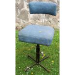 An early 20th century chrome and painted steel office swivel chair, on cruciform base, having