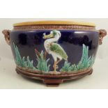 A Victorian majolica oval jardiniere, the body decorated with a Heron and leaves, af, diameter 17.
