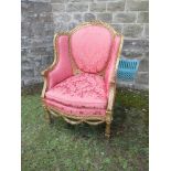 A continental style gilt framed armchair,