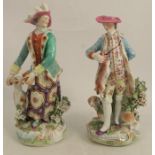 A pair of 19th century Derby porcelain figures, of a man and a woman with dogs, a bird and rabbit,