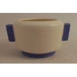 A 1930's Art Deco Poole Pottery Plane Ware footed bowl, with vertical two line handles, a cream body