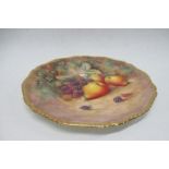 A Royal Worcester plate, decorated with hand painted fruit by Ayrton, diameter 10.5in - not