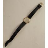 A ladies 9ct gold cased Omega wrist watch, with leather strap