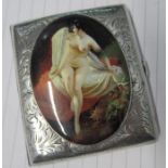 A white metal vesta cigarette case, with engraved decoration and a panel of a naked woman