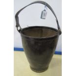 A leather fire bucket, stamped made in england