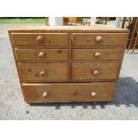 A small table top pine chest of drawers, height 18.5ins, width 24ins