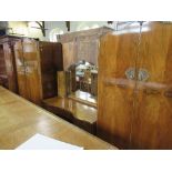 A Wrighton walnut bedroom suite, comprising two wardrobes, dressing table, bed frame together with a