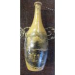 A Mauchline ware thimble holder, formed as a bottle, printed with Owestry Old Church, and a thimble