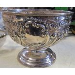 A silver pedestal bowl, with embossed decoration, diameter 6ins, height 4.5ins