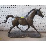 A resin model of a horse, signed Harriet Glen, height 10.5ins