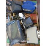 A collection of polaroid cameras, and other items