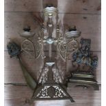 A brass candelabrum, in the Gothic manner, height 14.5ins, together with a brass shoe horn and a