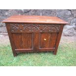 A small reproduction oak coffer, width 25ins x depth 13ins x height 18.5ins