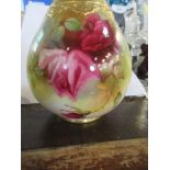 A Royal Worcester covered vase, decorated with roses by Rushton, shape number H103, height 8.25ins ,