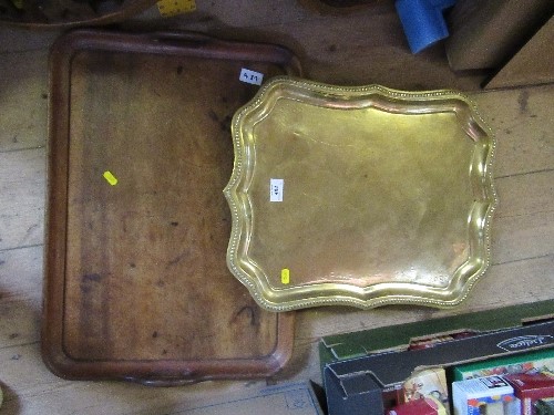 A wooden tray, together with a brass tray