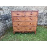 A 19th century mahogany chest of drawers, having two short over three long drawers, raised on