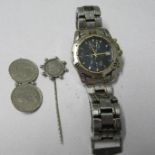 Accurist, a gentleman's two colour Chronograph bracelet watch, together with a coin mounted stickpin