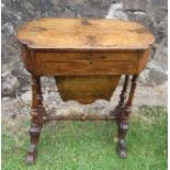 A Victorian burr walnut work table, with a marquetry top, fitted with a drawer and wool box below,