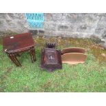 A carved oak hanging corner cabinet, height 27ins, together with a nest of tables and a magazine