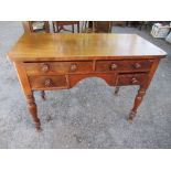 A 19th century mahogany desk or dressing table, having two frieze drawers and two short drawers