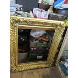 A gilt wood picture frame, decorated with flowers and scrolling leaves, aperture size 25.5ins x