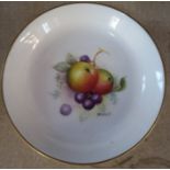 A Royal Worcester dish, decorated with fruit by H Everett, diameter 4.5ins