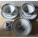 Two 20th century blue and white oriental style cups and saucers, together with a matching rice