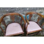 A pair of Edwardian mahogany and satinwood inlaid hoop back chairs, with pierced splats