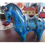 An Aldo Londi pottery model of a horse in green and blue glaze, unmarked, height 16ins