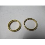 A 22ct gold plain wedding ring, together with another similar, 8.8g gross