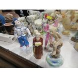 Four Royal Worcester figures, Water Baby, Chinoiserie Boy, Parakeet Boy,  and Katie together with