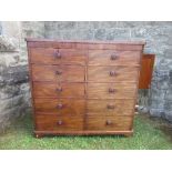 A 19th century mahogany compactum, formed as a chest of drawers, fitted with five deep short drawers