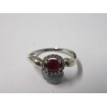 A ruby and diamond cluster ring, stamped '373' to the white mount, finger size P, 2g gross