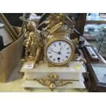 A French gilt metal and marble mantel clock, with drum movements, the case decorated with a figure