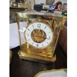 A Jaeger Le Coultre Atmos four glass and brass mantel clock