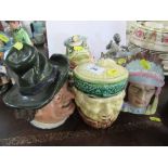 Five novelty tobacco jars, one formed as a frog, another of an Indian