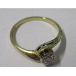 A single stone diamond 18 carat gold ring, the brilliant cut illusion set, finger size P, 2.8g