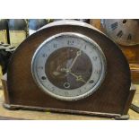 An Anvil oak cased mantel clock