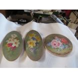 E H Chivers, three oils on wooden boards, one circular and two oval, all of flowers