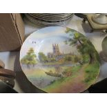 Three Royal Worcester plates, decorated with views of Cathedrals, Hereford, Worcester and