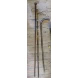 An antique sword stick, with bamboo shaft, length 39ins, together with a hardwood tribal stick
