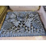 A Victorian dark wood, possibly ebony, carved box lid, relief carved with flowers, grapes and