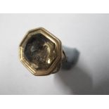 An early 19th century very small seal fob, the foil backed stone engraved with a female in profile -